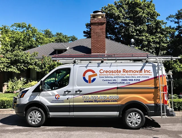 Colorado Springs Chimney Sweep technician removing creosote safely in Colorado Springs, CO