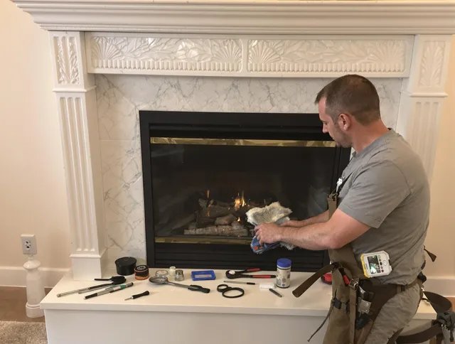 Colorado Springs Chimney Sweep performing fireplace maintenance in Colorado Springs, CO